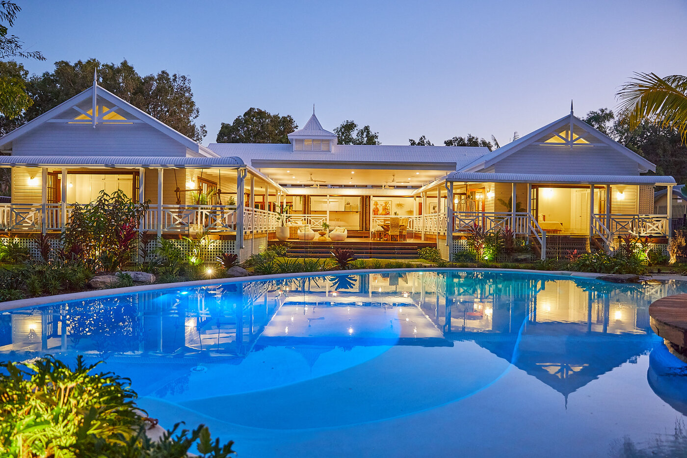 External Shot of Pool and White House at Night