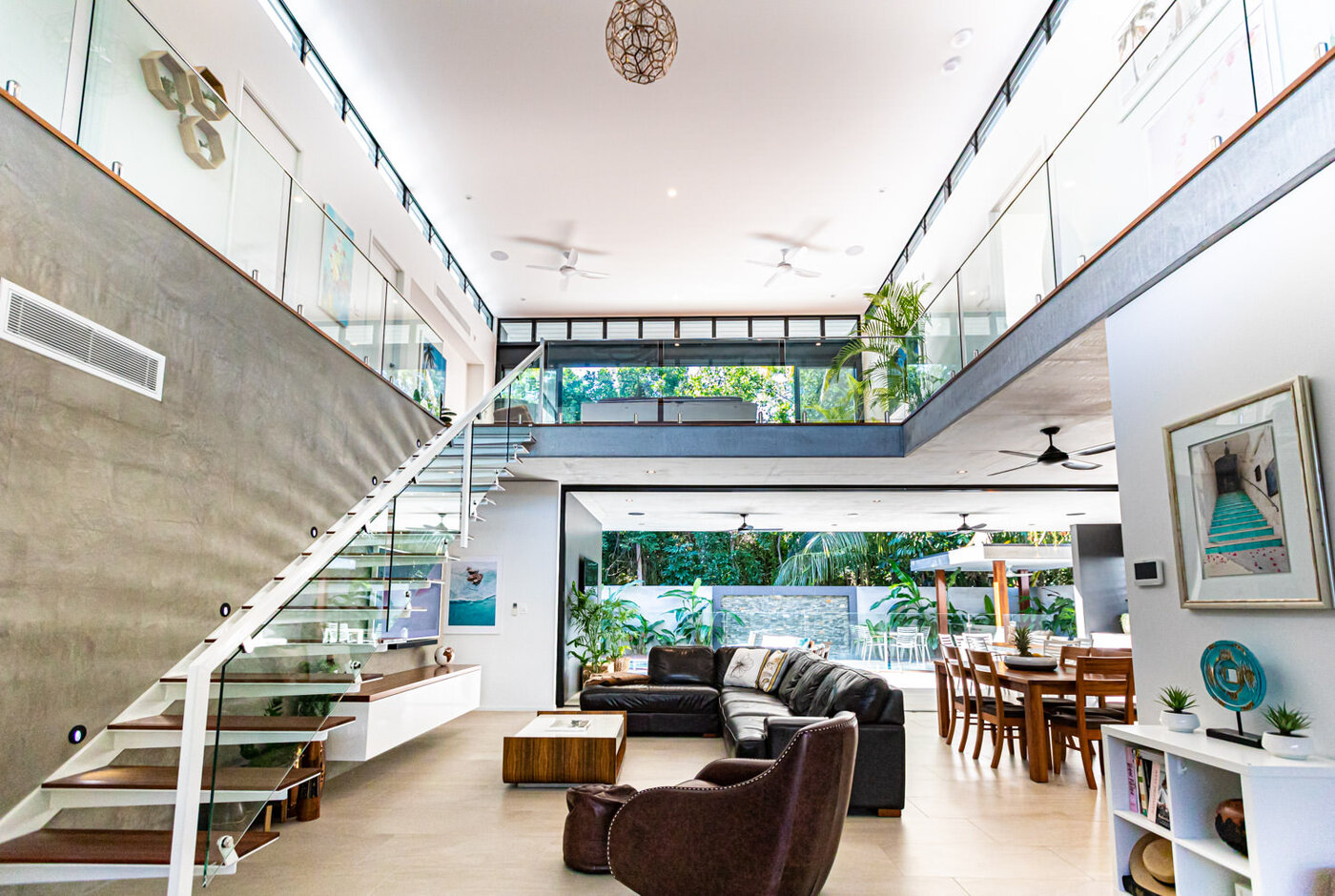 Large atrium showcases the elaborate seven-metre height, off-form concrete ceilings & open plan living spaces